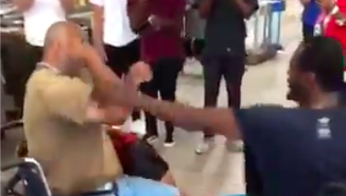 Two men in wheelchairs get into a fight over crayons