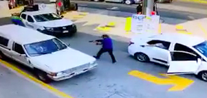 Hearse driver gets riddled with an AK47