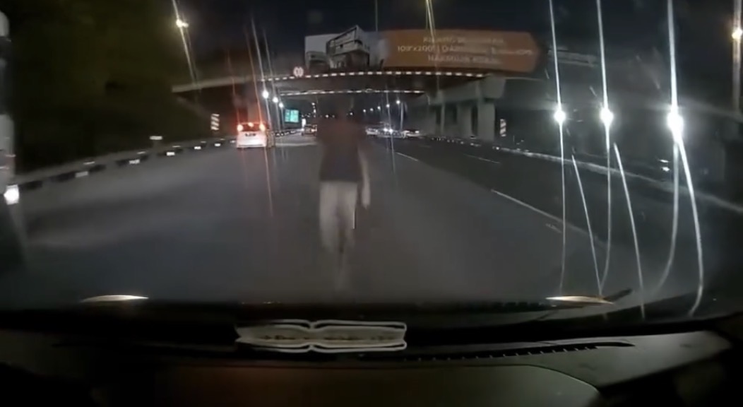 Pedestrian killed after being struck by a car while crossing an expressway at night - Malaysia