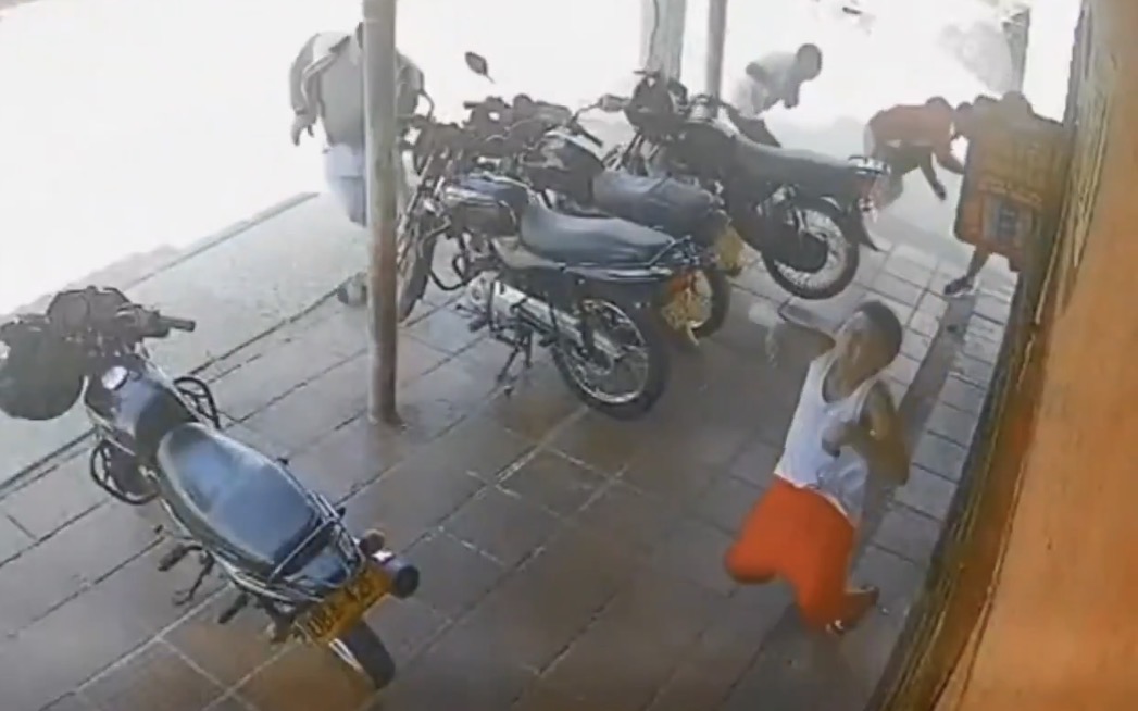 12-year-old boy killed by a stray bullet during a drive-by shooting outside a store in - Colombia