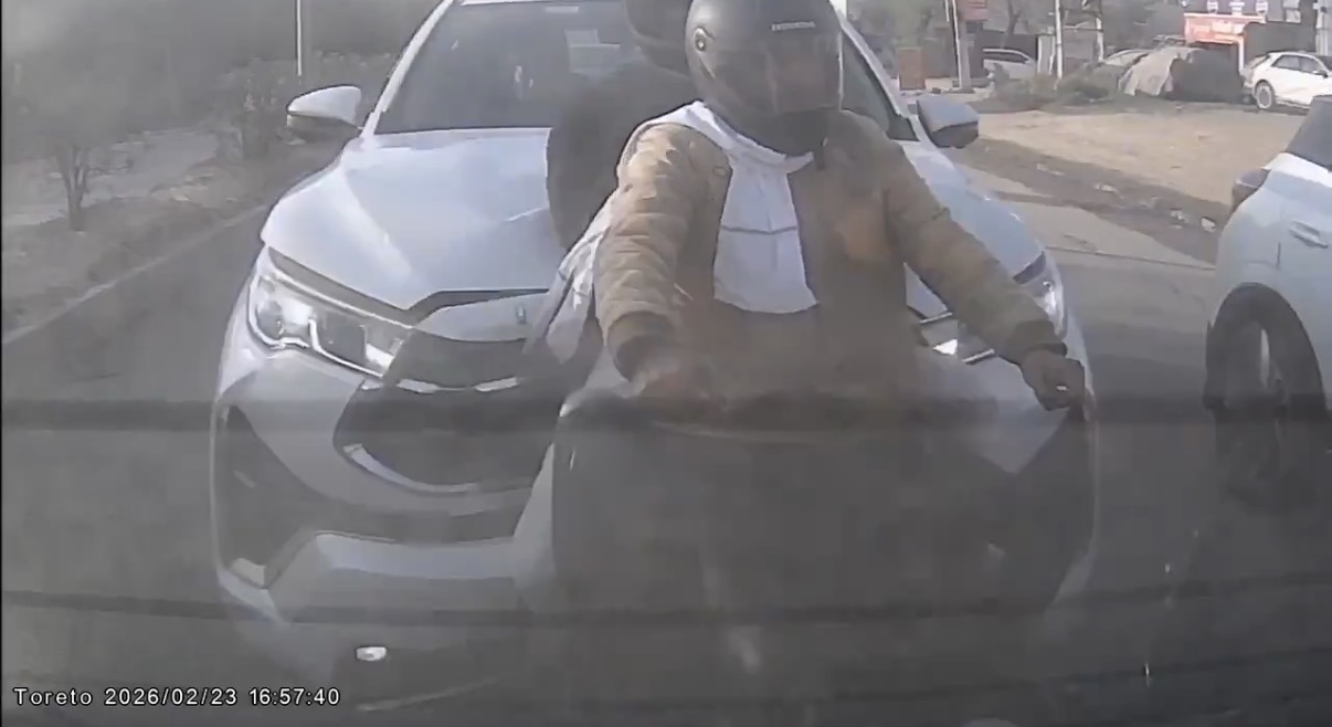 Dashcam footage captures the moment a car slams into a motorcycle - India