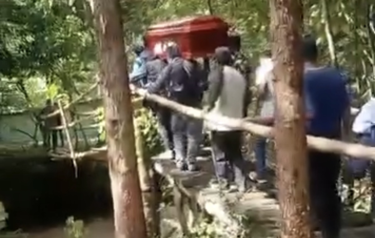 Bridge collapses during funeral procession, sending coffin into stream - Peru