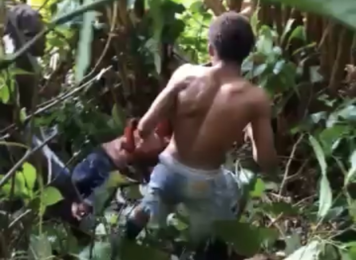 Police are seeking help to identify suspects seen in a viral video showing the apparent beheading of an unidentified man - Trinidad