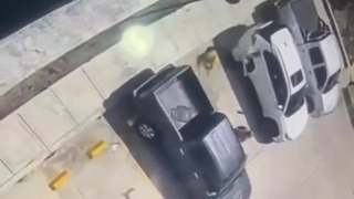 Surveillance footage captured the moments leading up to a fatal shooting in a residential car park - Colombia