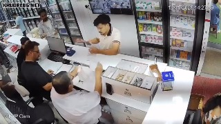 Cashier shot dead after gunmen stormed a medical store and opened fire with a handgun fitted with a switch - India